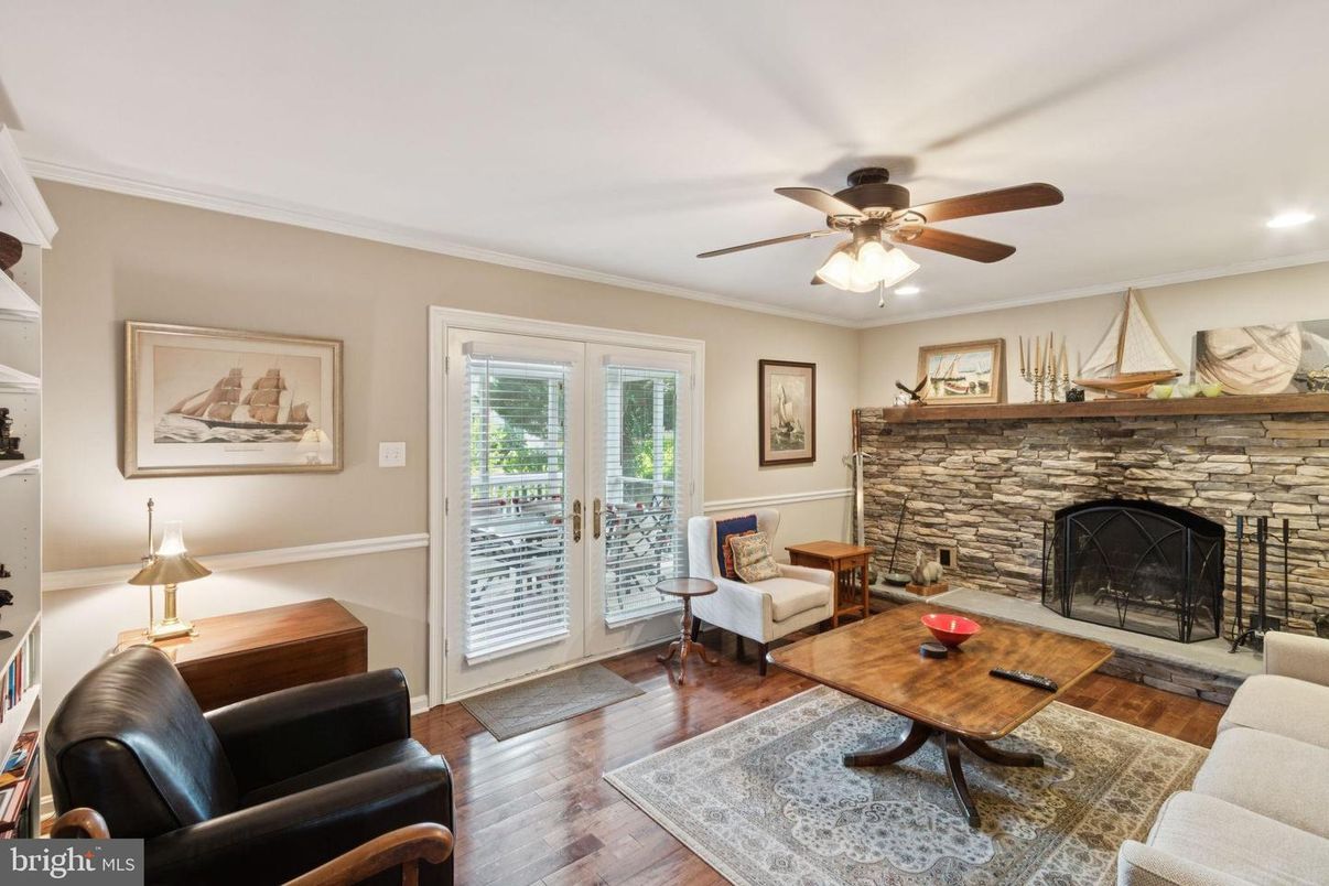 Fireplace, Interior, Living room, Recessed Lighting, Stone Walls, Wood Texture Flooring