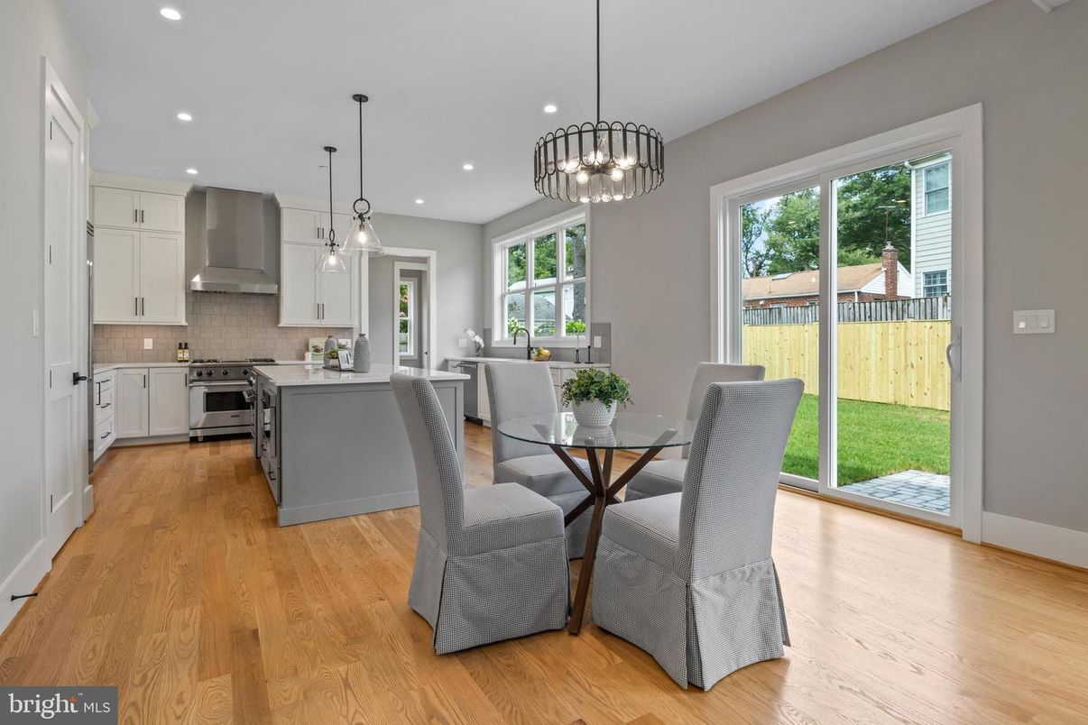 Dining room, Interior, Kitchen, Pendant Lights, Recessed Lighting, Stainless Steel Appliances, Wood Texture Flooring