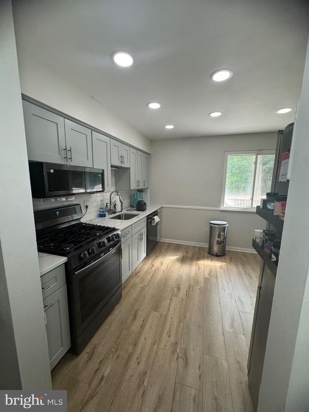 Interior, Kitchen, Recessed Lighting, Stainless Steel Appliances, Wood Texture Flooring
