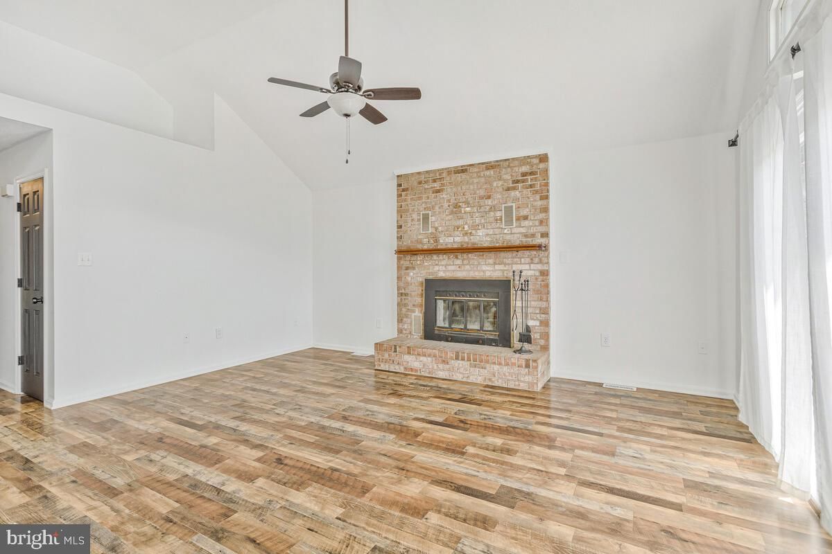 Empty room, Fireplace, Interior, Stone Walls, Wood Texture Flooring