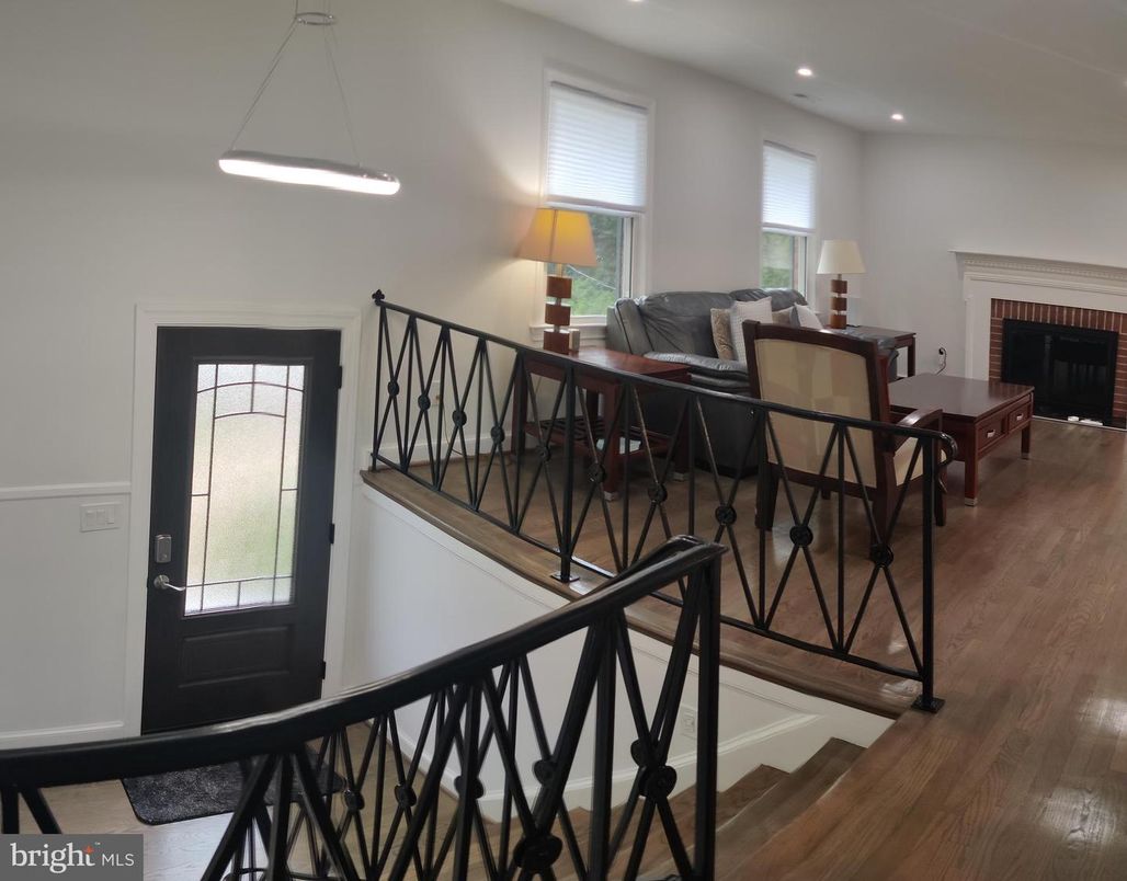 Dining room, Fireplace, Interior, Pendant Lights, Recessed Lighting, Wood Texture Flooring