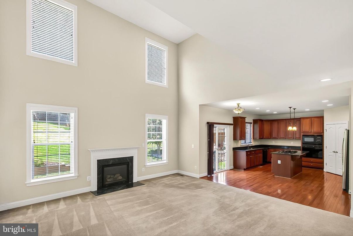 Fireplace, Interior, Kitchen, Pendant Lights, Recessed Lighting, Stainless Steel Appliances, Wood Texture Flooring