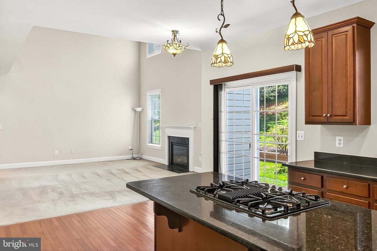 Chandelier, Fireplace, Interior, Kitchen, Pendant Lights, Wood Texture Flooring