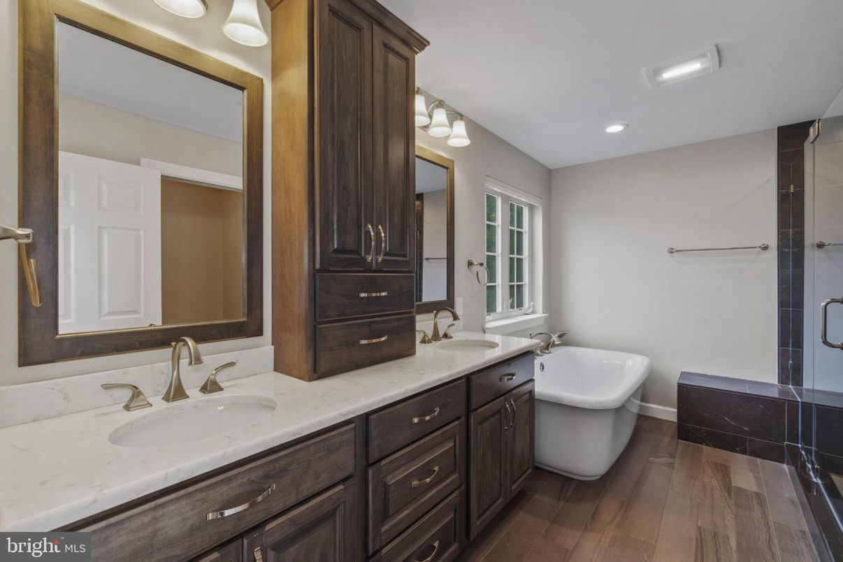 Bathroom, Dual Sink Vanities, Free Standing Baths, Interior, Recessed Lighting, Wood Texture Flooring