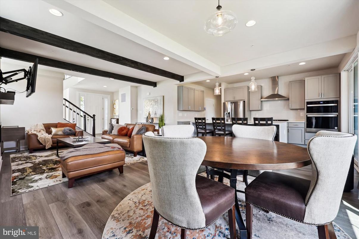 Dining room, Interior, Kitchen, Living room, Pendant Lights, Recessed Lighting, Stainless Steel Appliances, Wood Texture Flooring