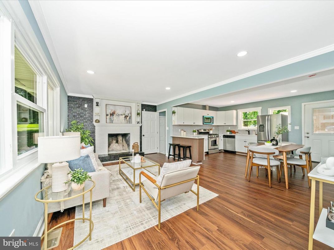 Dining room, Fireplace, Interior, Kitchen, Living room, Recessed Lighting, Stainless Steel Appliances, Wood Texture Flooring