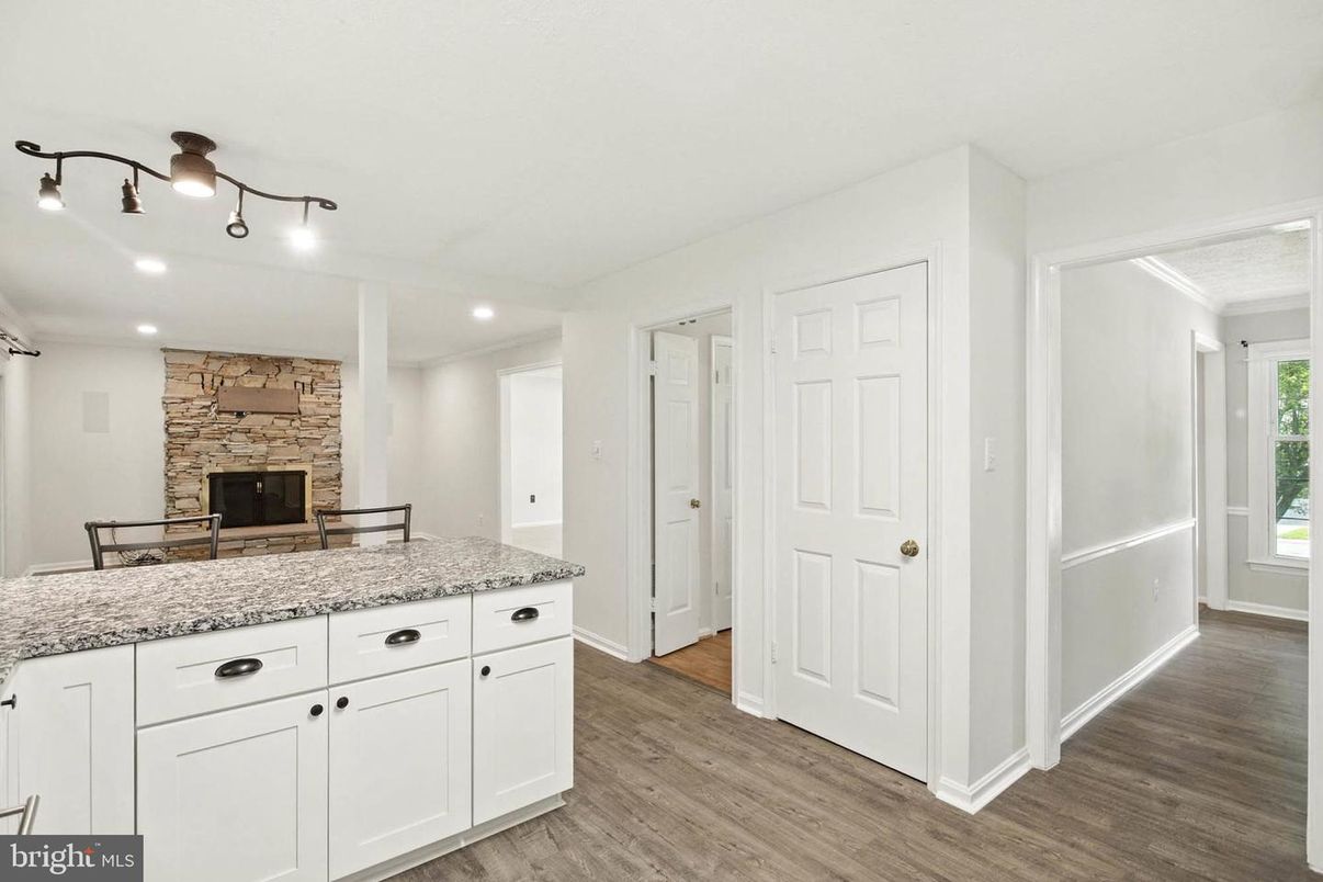 Fireplace, Interior, Recessed Lighting, Stone Walls, Wood Texture Flooring