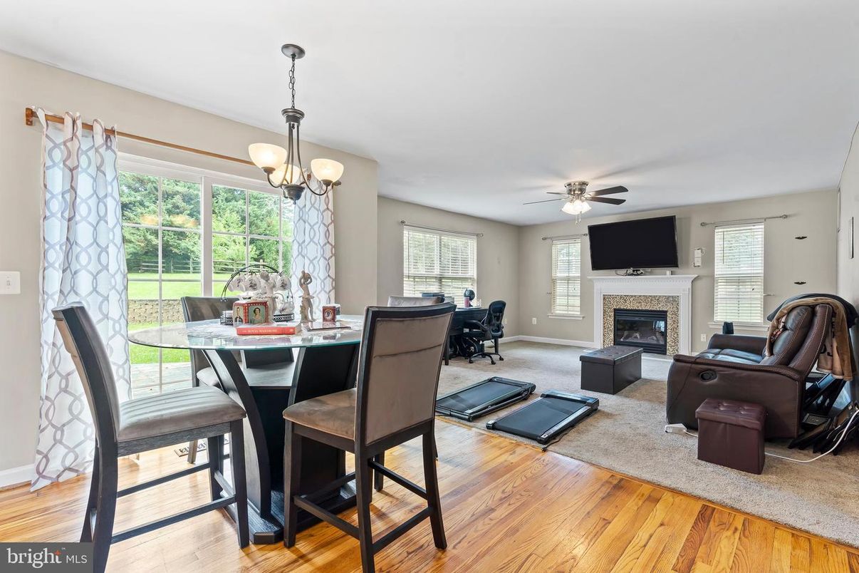 Dining room, Fireplace, Interior, Living room, Pendant Lights, Wood Texture Flooring