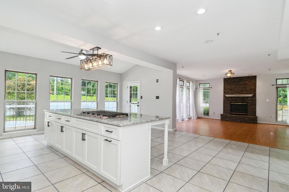 Fireplace, Interior, Kitchen, Recessed Lighting, Wood Texture Flooring