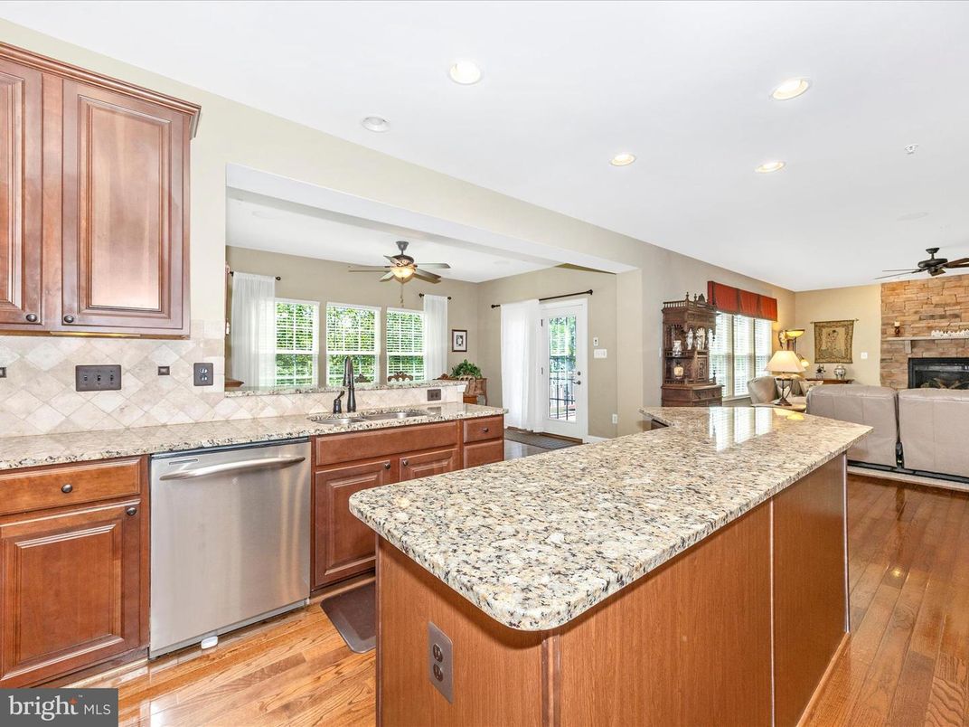 Fireplace, Interior, Kitchen, Recessed Lighting, Stone Walls, Wood Texture Flooring