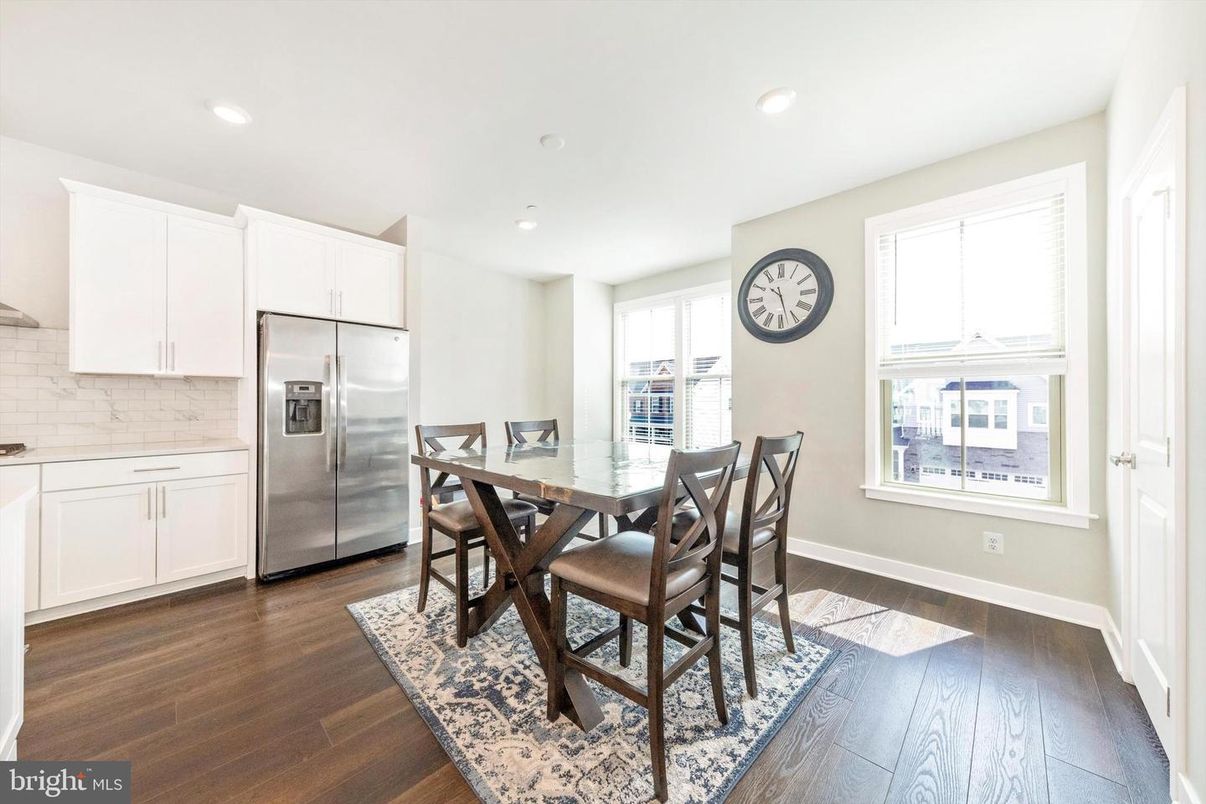 Dining room, Interior, Kitchen, Recessed Lighting, Stainless Steel Appliances, Wood Texture Flooring