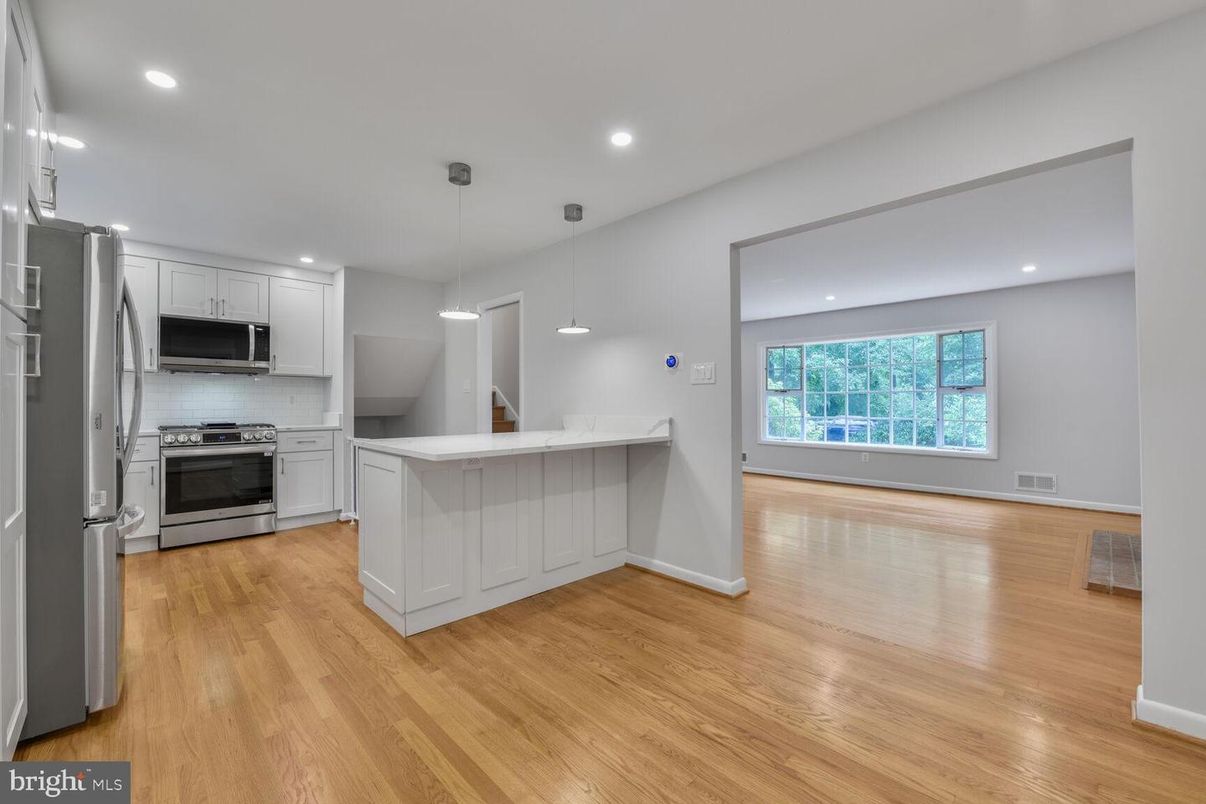 Interior, Kitchen, Pendant Lights, Recessed Lighting, Stainless Steel Appliances, Wood Texture Flooring
