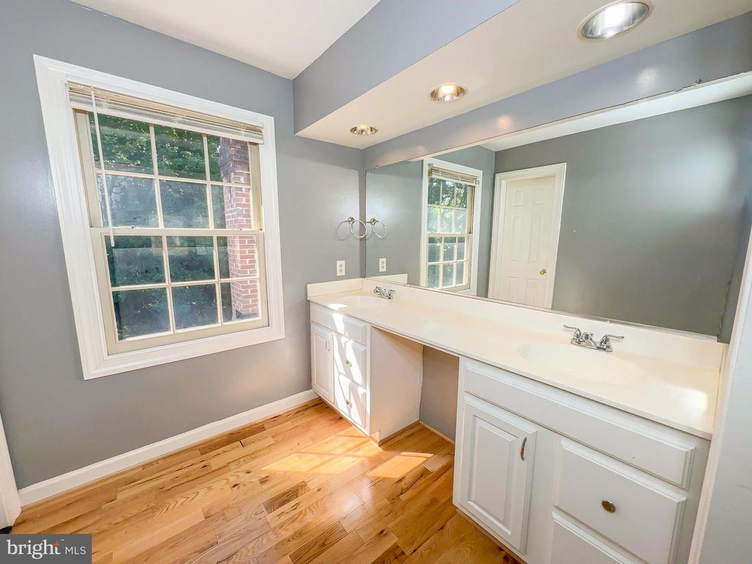 Bathroom, Dual Sink Vanities, Interior, Recessed Lighting, Wood Texture Flooring