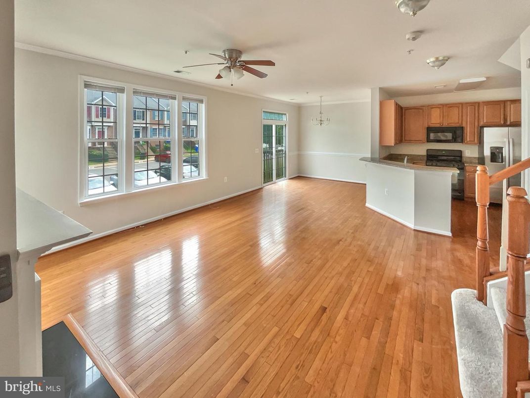 Empty room, Interior, Kitchen, Stainless Steel Appliances, Wood Texture Flooring