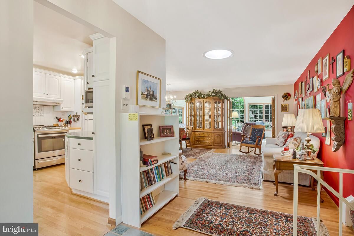 Chandelier, Interior, Kitchen, Living room, Recessed Lighting, Stainless Steel Appliances, Wood Texture Flooring