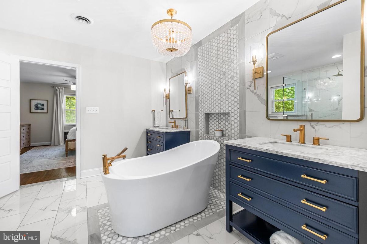 Bathroom, Chandelier, Dual Sink Vanities, Free Standing Baths, Interior, Marble, Marble Walls, Recessed Lighting