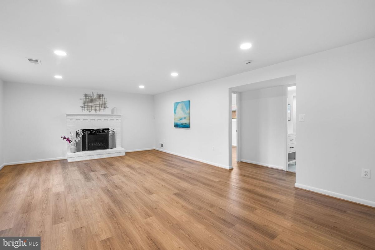Empty room, Fireplace, Interior, Recessed Lighting, Wood Texture Flooring