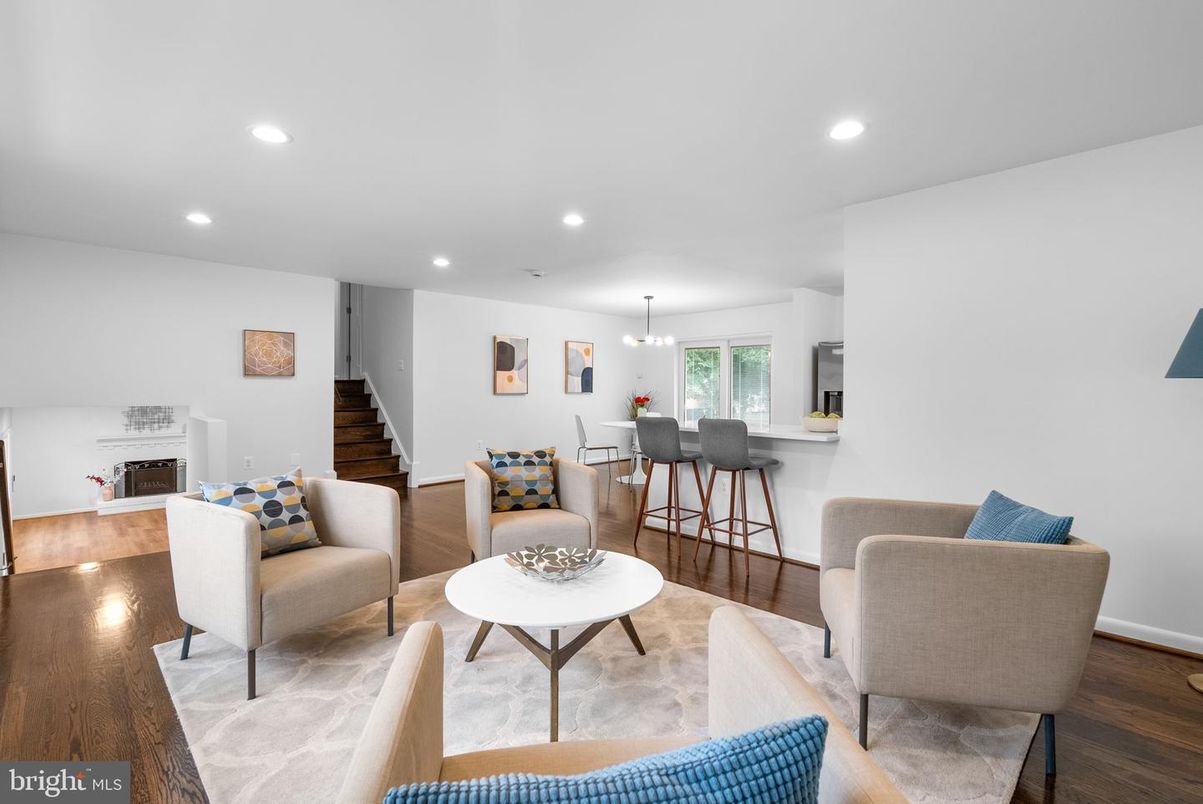 Dining room, Fireplace, Interior, Living room, Pendant Lights, Recessed Lighting, Wood Texture Flooring
