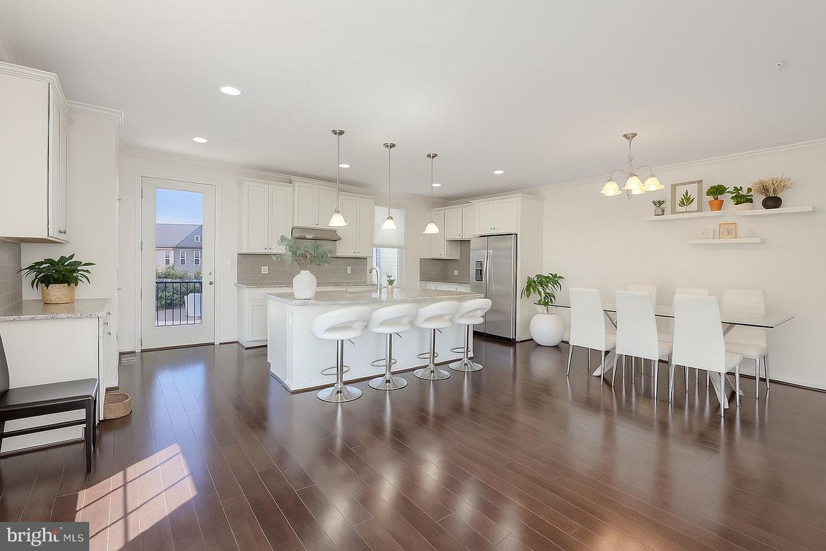 Dining room, Interior, Kitchen, Pendant Lights, Recessed Lighting, Stainless Steel Appliances, Wood Texture Flooring