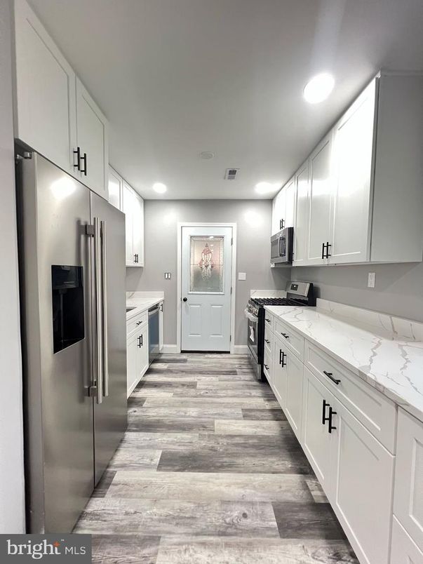 Interior, Kitchen, Recessed Lighting, Stainless Steel Appliances, Wood Texture Flooring