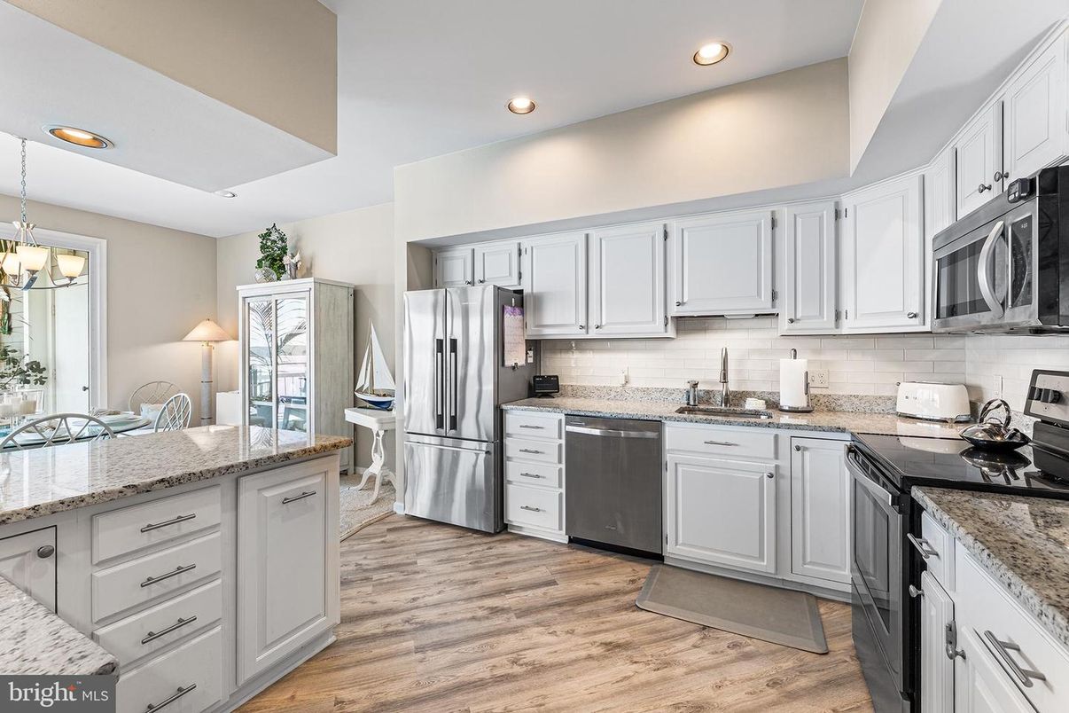 Chandelier, Interior, Kitchen, Recessed Lighting, Stainless Steel Appliances, Wood Texture Flooring