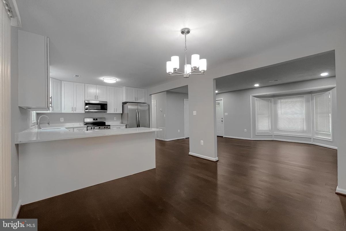 Chandelier, Interior, Kitchen, Pendant Lights, Recessed Lighting, Stainless Steel Appliances, Wood Texture Flooring