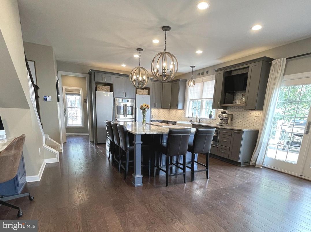 Chandelier, Interior, Kitchen, Pendant Lights, Recessed Lighting, Stainless Steel Appliances, Wood Texture Flooring