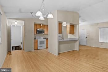 Interior, Kitchen, Pendant Lights, Stainless Steel Appliances, Wood Texture Flooring