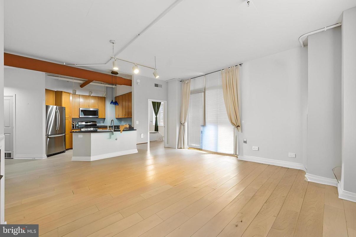 Empty room, Interior, Kitchen, Pendant Lights, Stainless Steel Appliances, Wood Texture Flooring