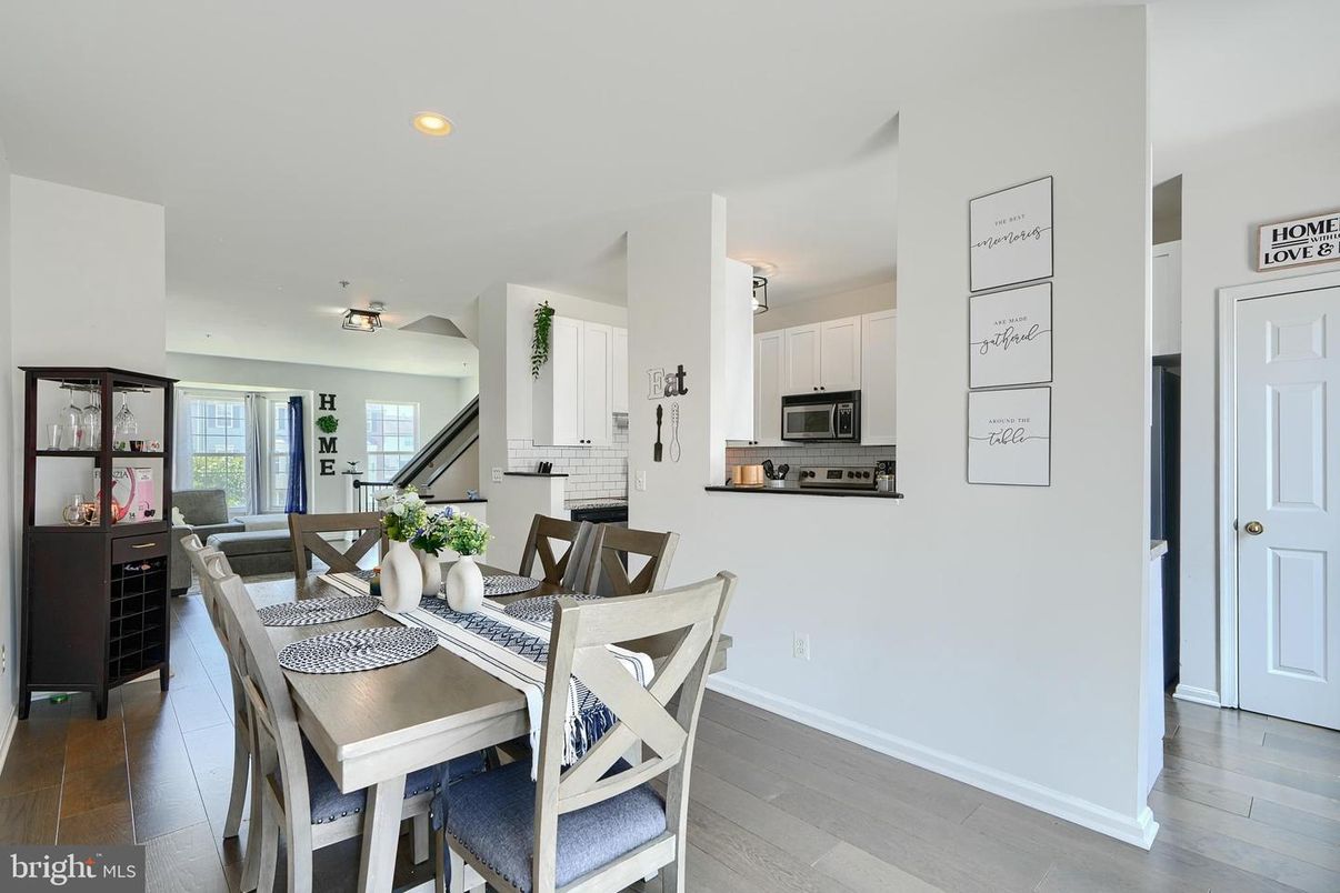 Dining room, Interior, Kitchen, Recessed Lighting, Stainless Steel Appliances, Wood Texture Flooring