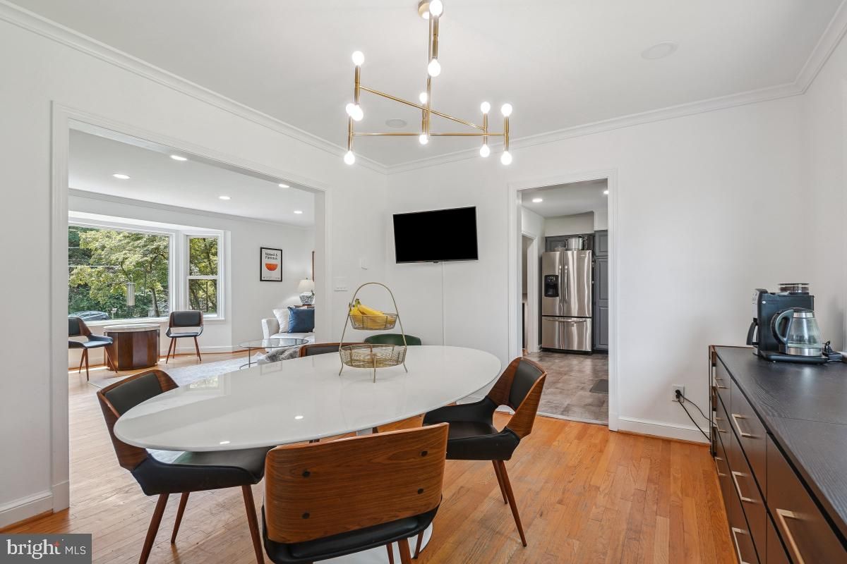 Dining room, Interior, Kitchen, Pendant Lights, Recessed Lighting, Stainless Steel Appliances, Wood Texture Flooring