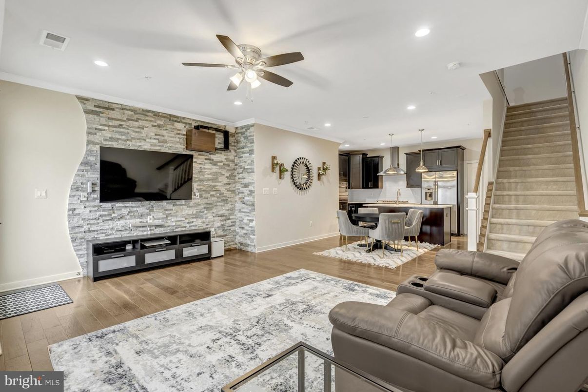 Dining room, Interior, Kitchen, Living room, Pendant Lights, Recessed Lighting, Stainless Steel Appliances, Stone Walls, Wood Texture Flooring