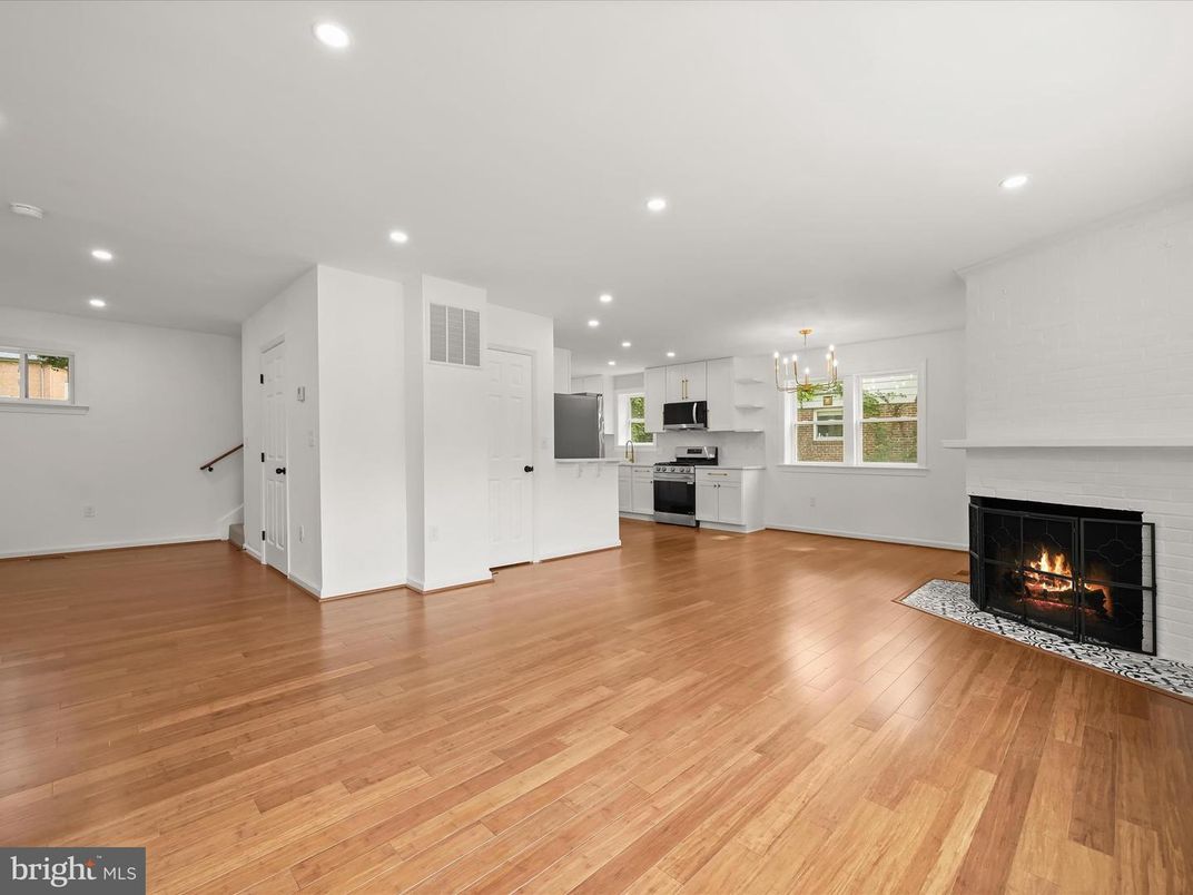 Chandelier, Empty room, Fireplace, Interior, Kitchen, Pendant Lights, Recessed Lighting, Wood Texture Flooring