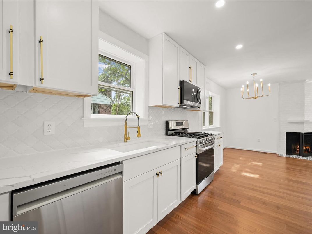 Fireplace, Interior, Kitchen, Pendant Lights, Recessed Lighting, Stainless Steel Appliances, Wood Texture Flooring