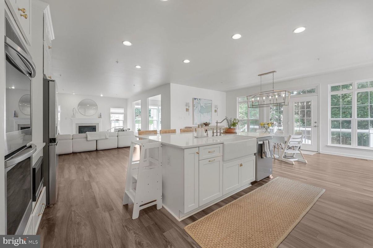 Dining room, Fireplace, Interior, Kitchen, Living room, Pendant Lights, Recessed Lighting, Wood Texture Flooring