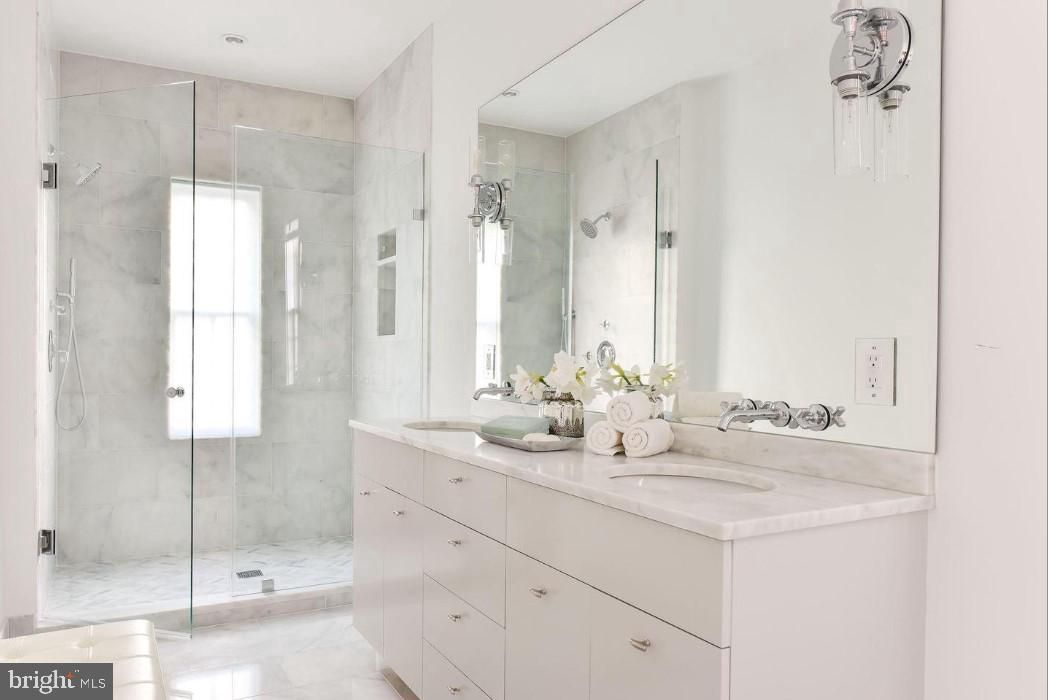 Bathroom, Dual Sink Vanities, Glass Shower, Interior, Marble, Marble Walls, Recessed Lighting