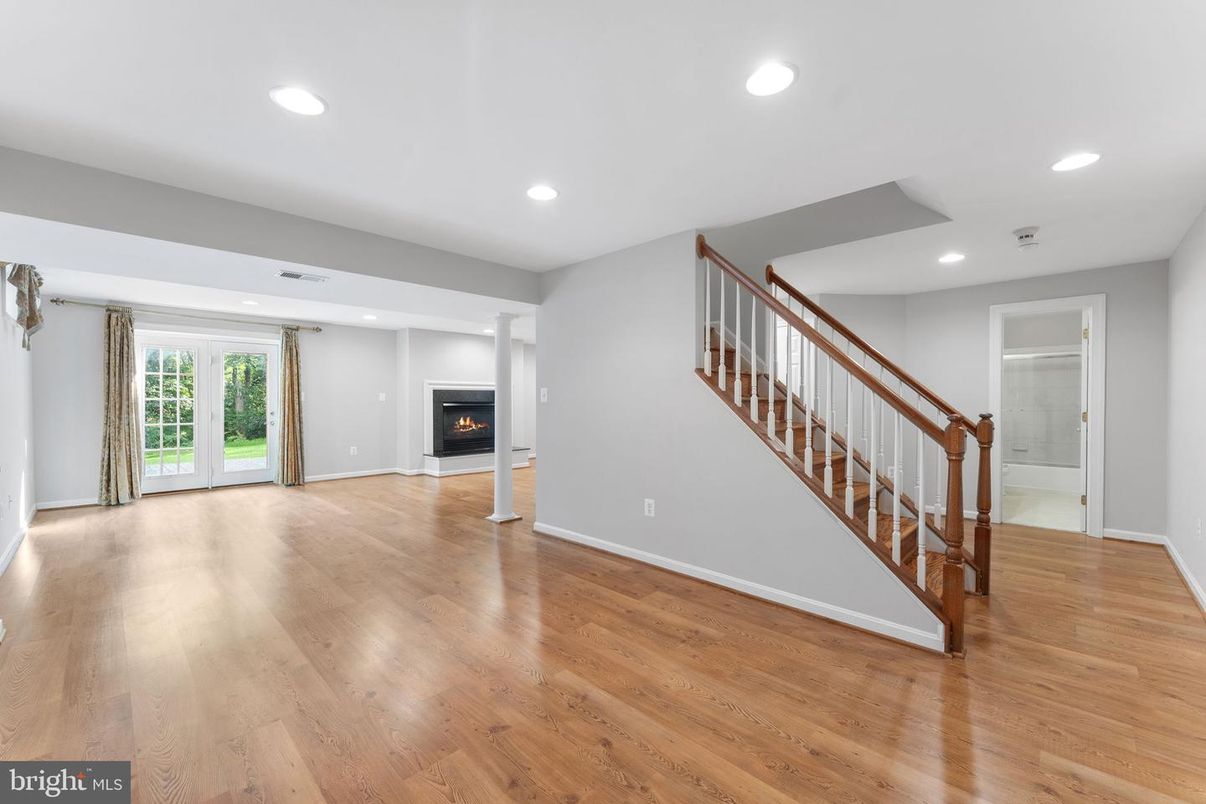 Empty room, Fireplace, Interior, Recessed Lighting, Wood Texture Flooring
