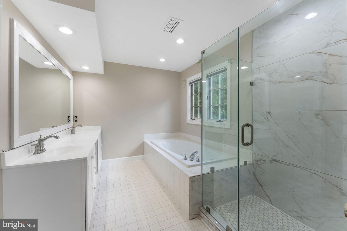 Bathroom, Dual Sink Vanities, Glass Shower, Interior, Marble Walls, Recessed Lighting