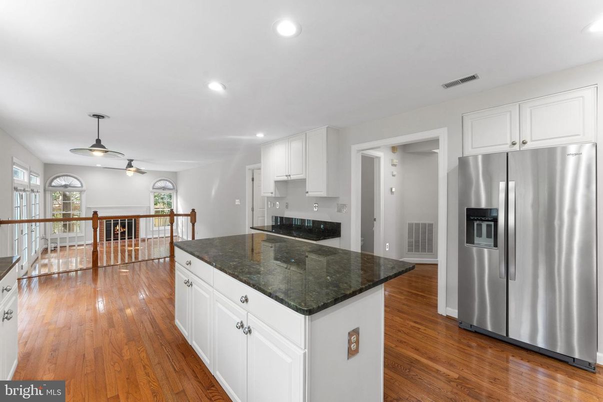 Dining room, Interior, Kitchen, Recessed Lighting, Stainless Steel Appliances, Wood Texture Flooring