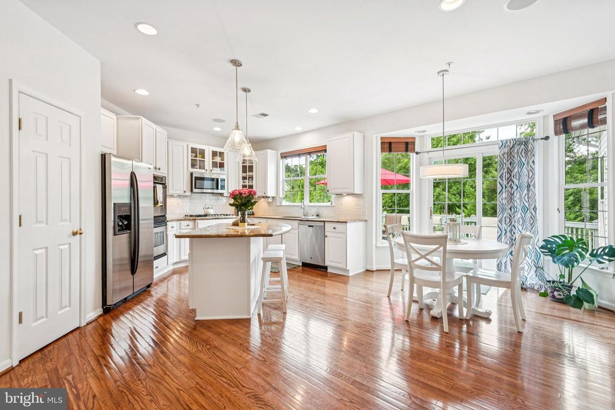 Dining room, Interior, Kitchen, Pendant Lights, Recessed Lighting, Stainless Steel Appliances, Wood Texture Flooring