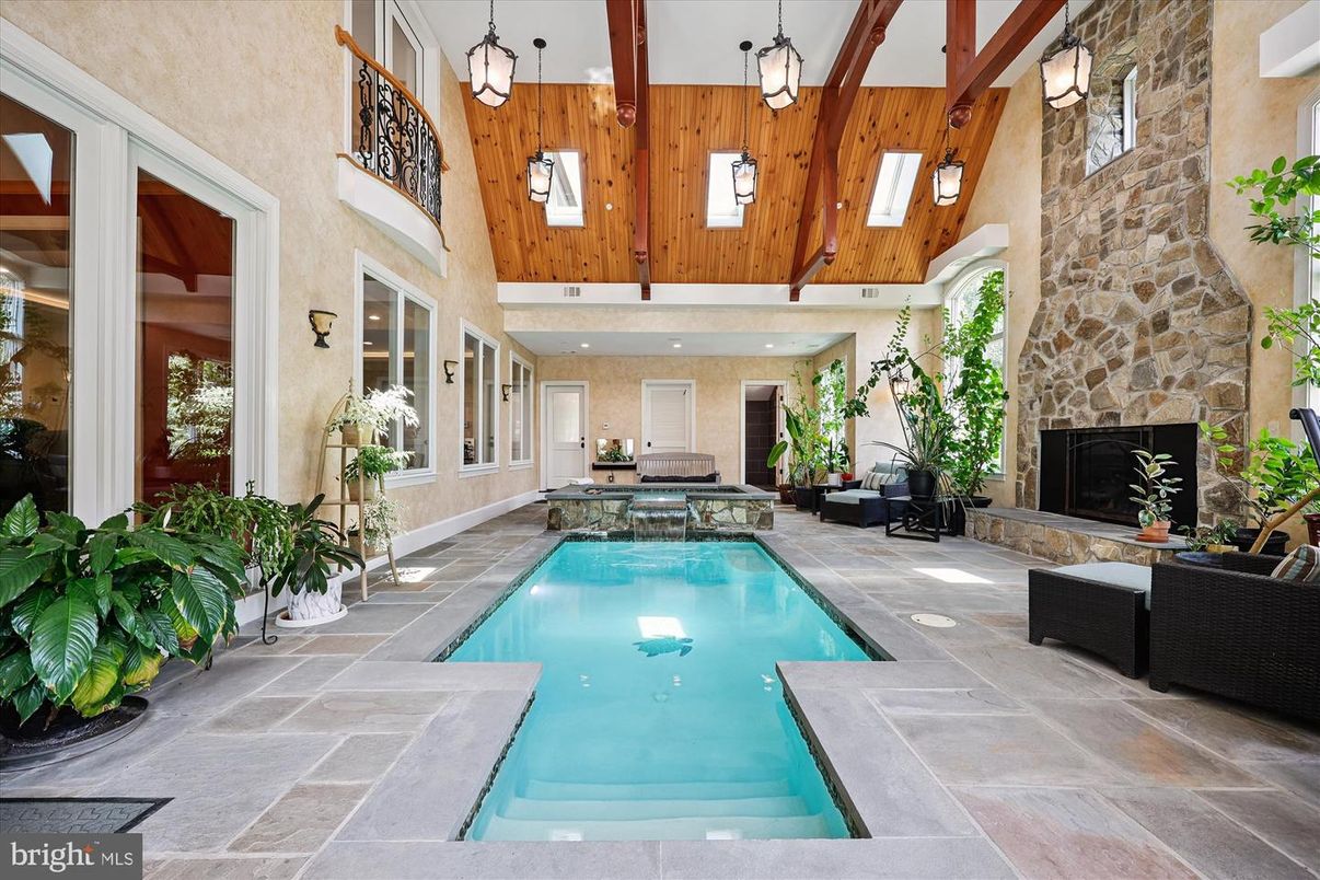 Fireplace, Interior, Pendant Lights, Pool, Recessed Lighting, Stone Walls, Wooden Beams