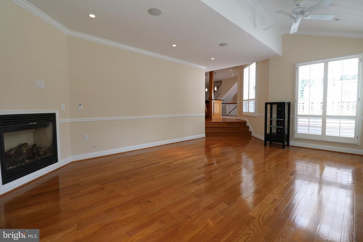 Empty room, Fireplace, Interior, Recessed Lighting, Wood Texture Flooring