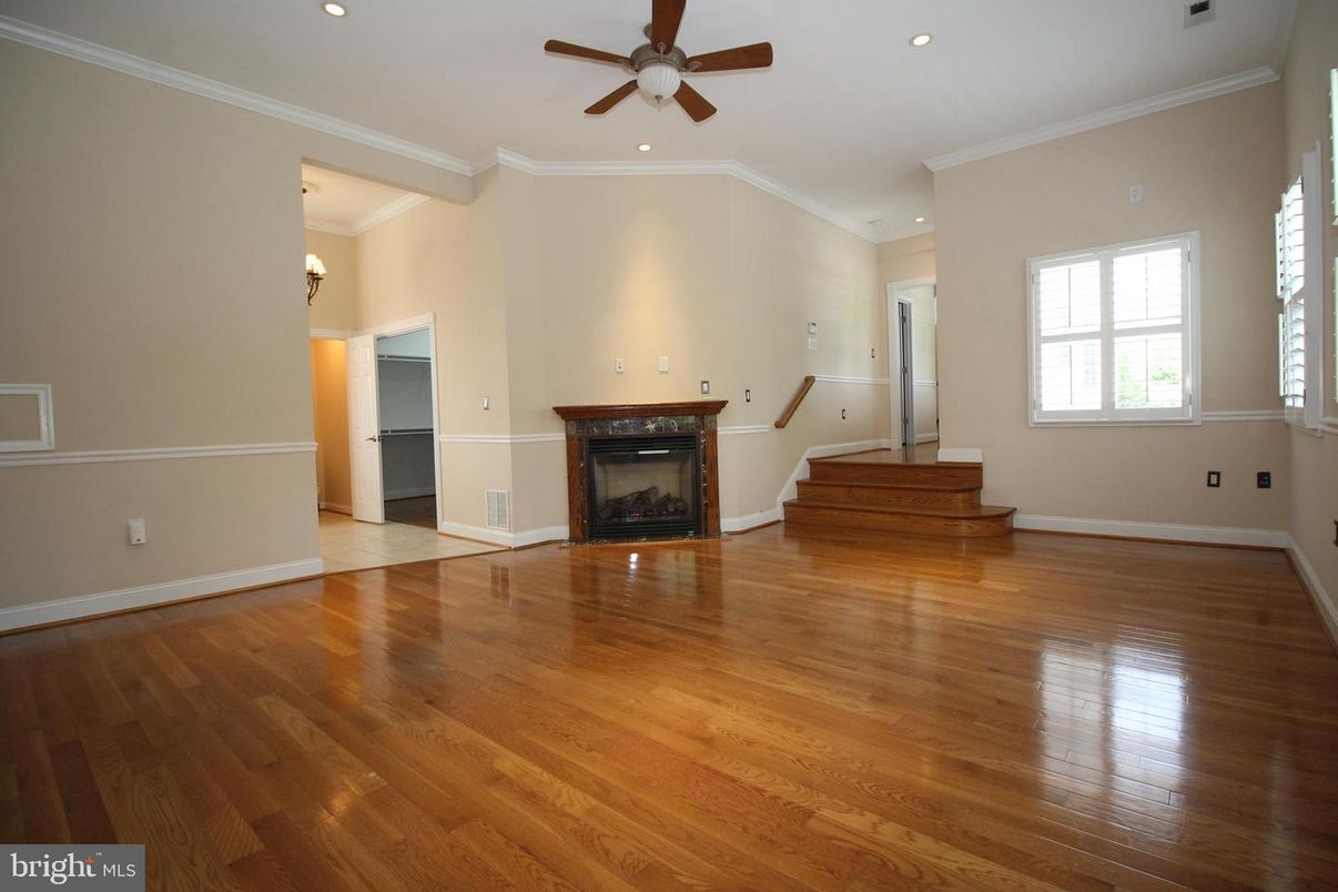 Empty room, Fireplace, Interior, Recessed Lighting, Wood Texture Flooring
