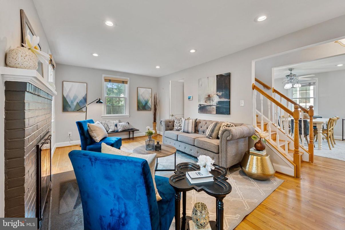 Dining room, Fireplace, Interior, Living room, Recessed Lighting, Wood Texture Flooring