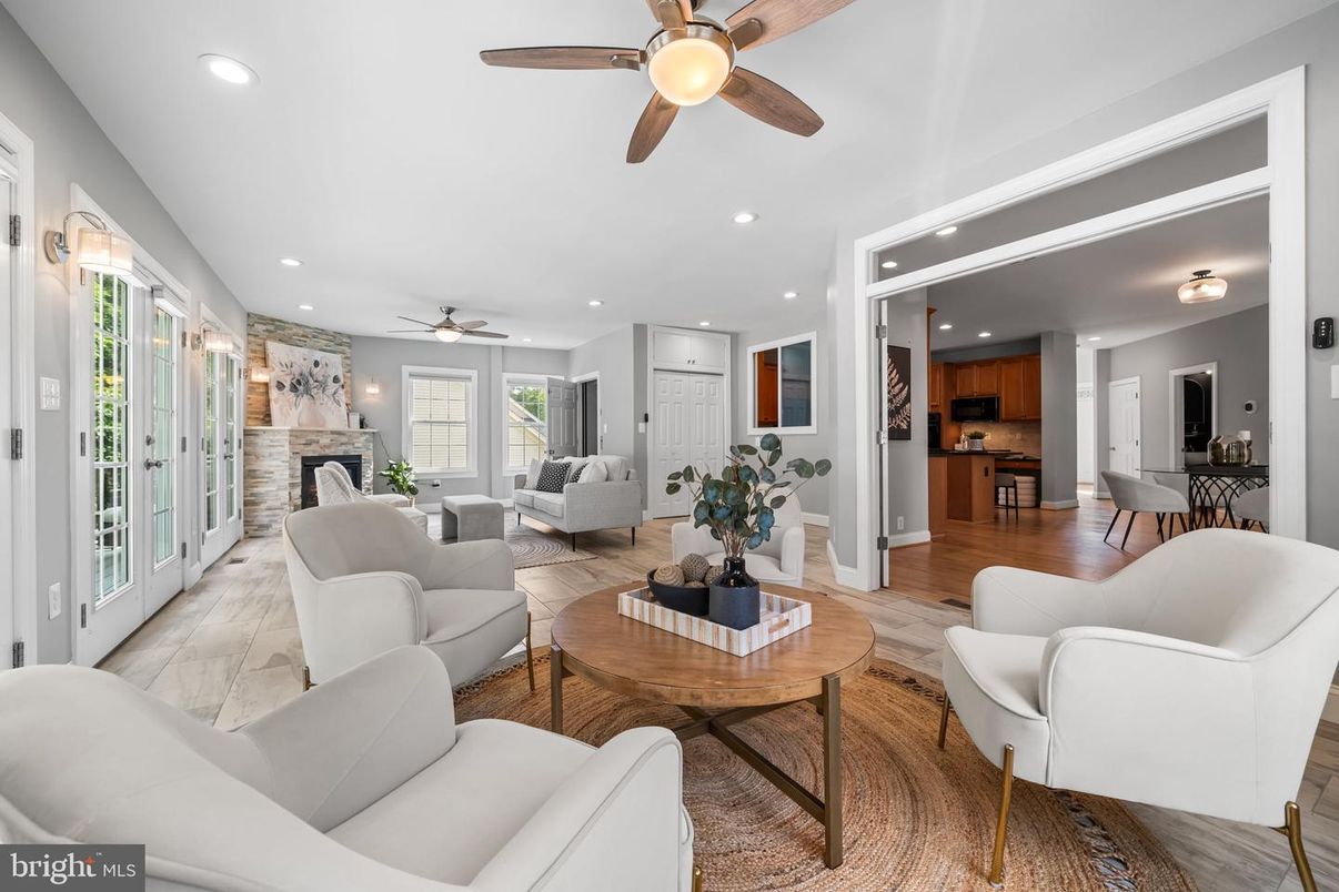 Dining room, Fireplace, Interior, Kitchen, Living room, Recessed Lighting, Wood Texture Flooring