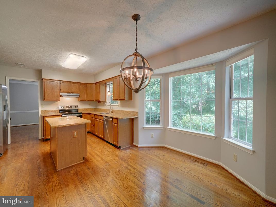 Chandelier, Interior, Kitchen, Pendant Lights, Stainless Steel Appliances, Wood Texture Flooring