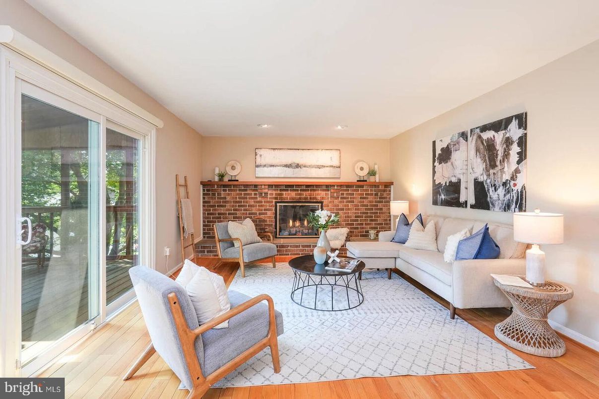 Fireplace, Interior, Living room, Recessed Lighting, Stone Walls, Wood Texture Flooring