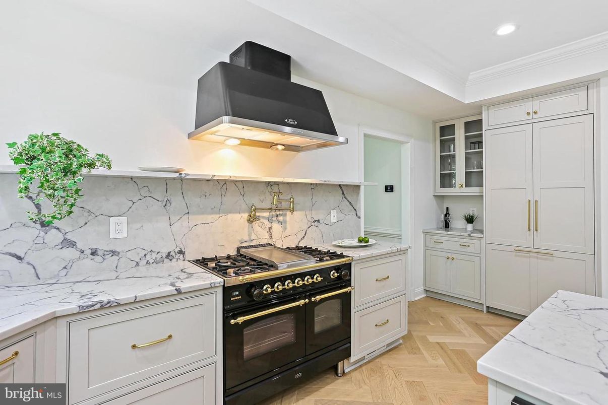 Interior, Kitchen, Marble Walls, Recessed Lighting, Stainless Steel Appliances, Wood Texture Flooring