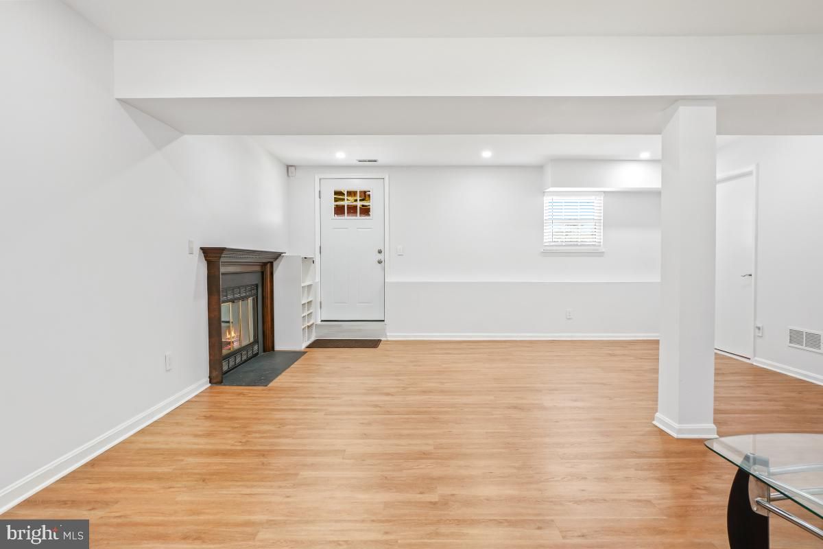 Empty room, Fireplace, Interior, Recessed Lighting, Wood Texture Flooring