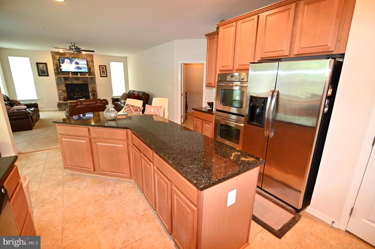 Fireplace, Interior, Kitchen, Living room, Recessed Lighting, Stainless Steel Appliances